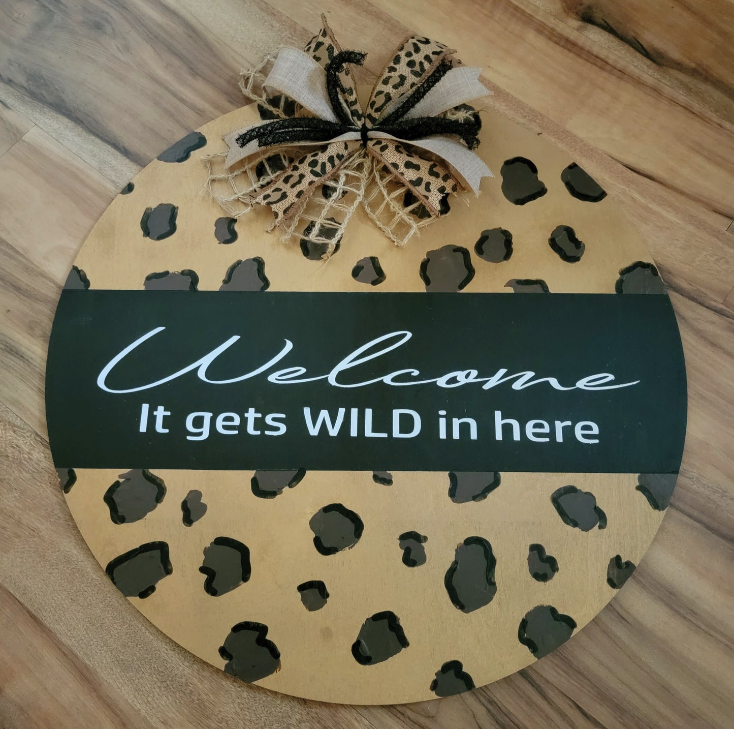 Welcome, it gets wild in here door hanger