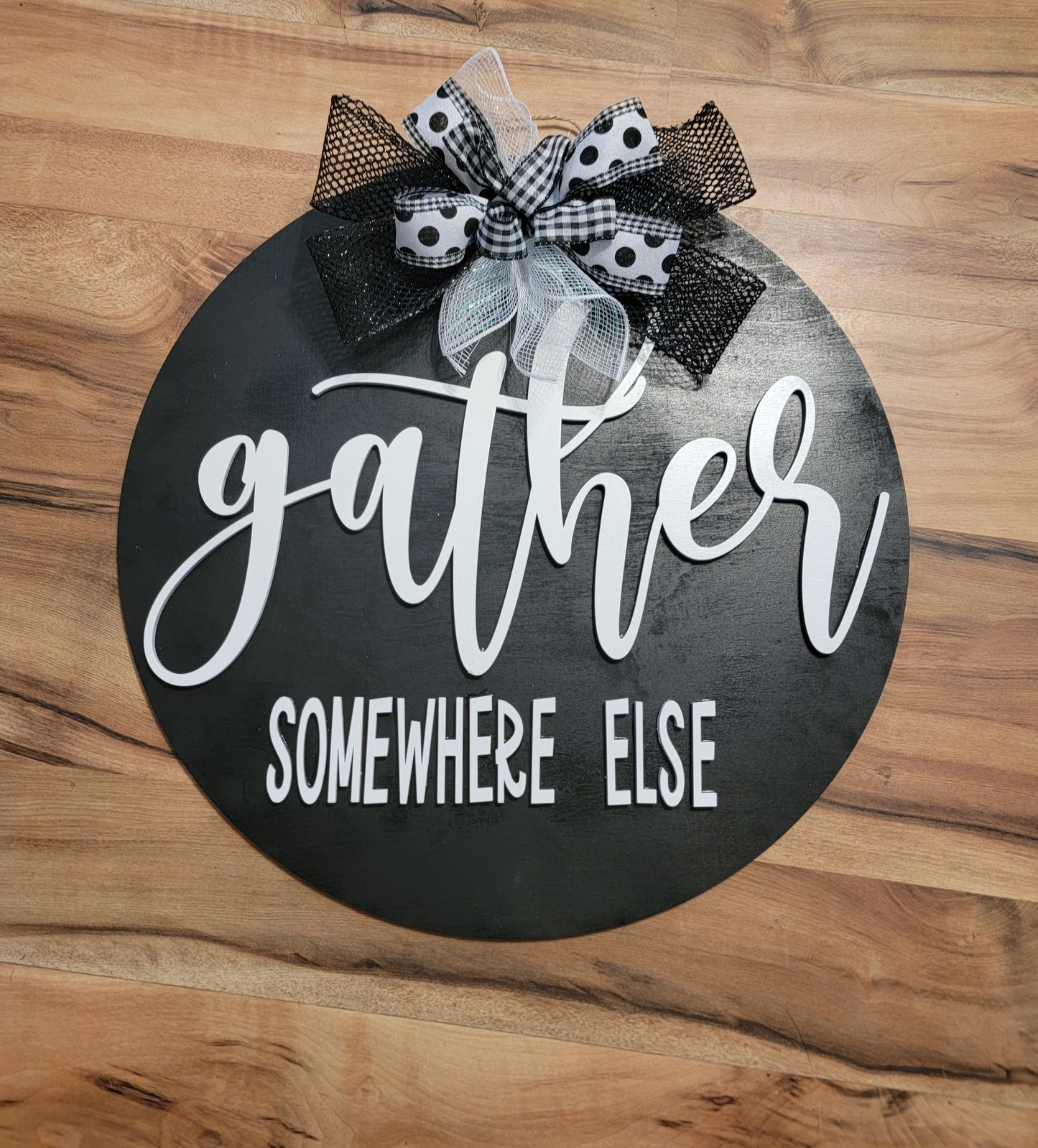 Gather somewhere else door hanger